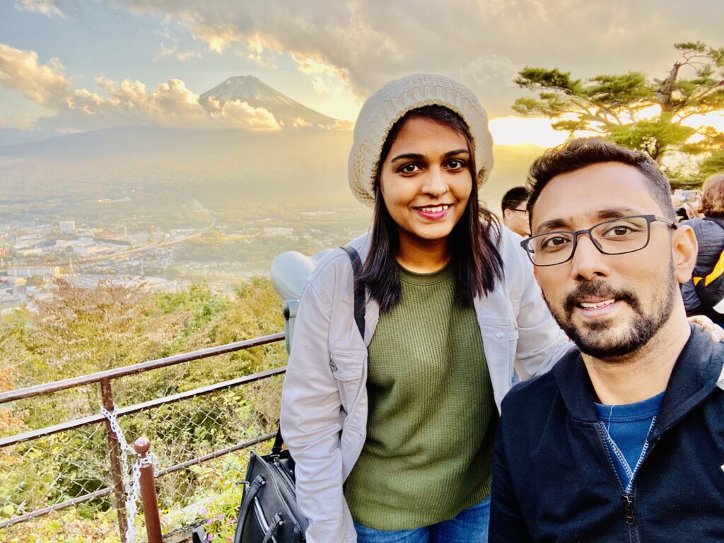 A couple posing with Mount Fuji view at sunset